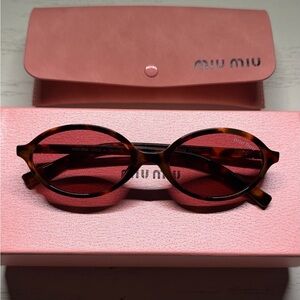Miu Miu Pink Lens Sunglasses